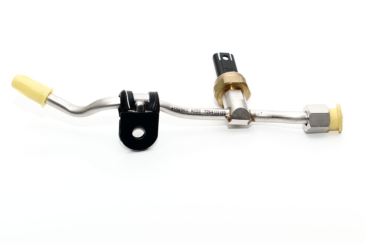Beschriftung auf einer Metallrohrleitung Beschriftete Rohrleitung für die Automobilindustrie